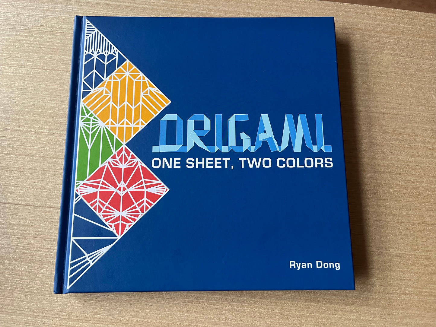 【Hardcover book】One Sheet Two Colors by Ryan Dong